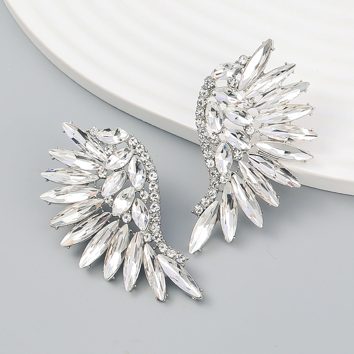 031e0c428c4cfa2101aae4f02d40576c.jpeg Fashionslee Women Rainbow Rhinestone Earrings