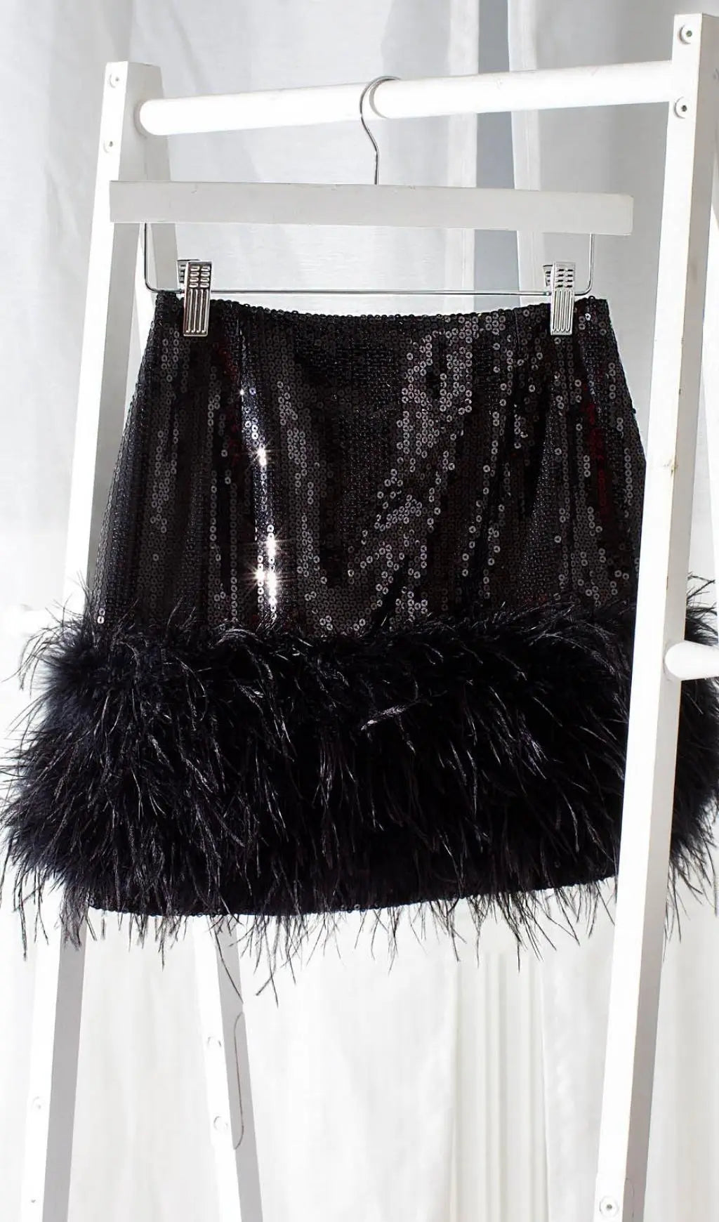 042b54a8d8378feeca637c7c7cb155fa.jpeg Fashionslee Women Sequin Feather Mini Skirt