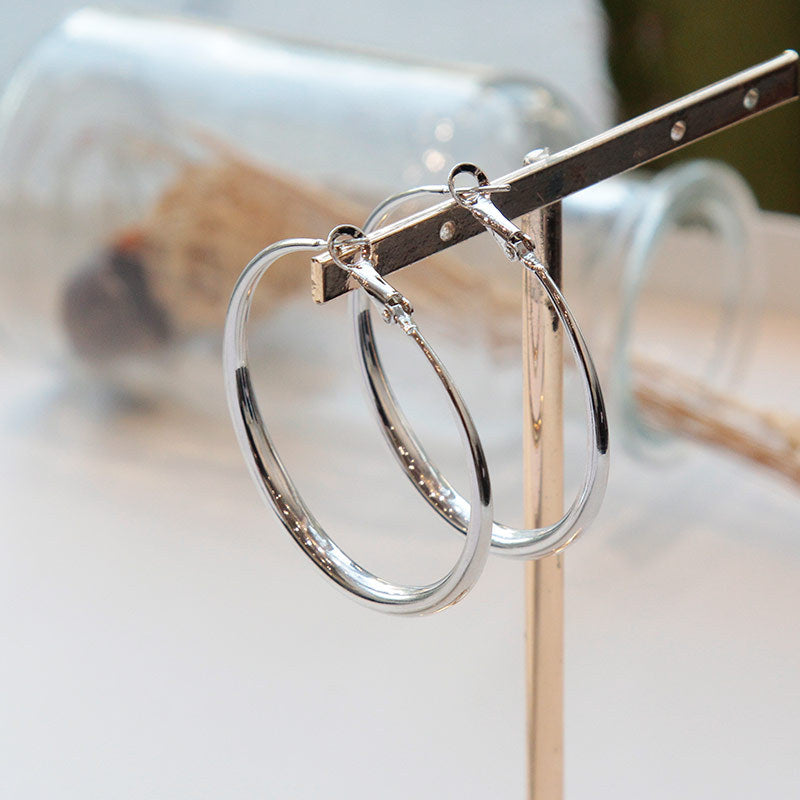 04c02e0805defb5051258185299a74f2.jpeg Fashionslee Women Tigerlily Hoop Earrings