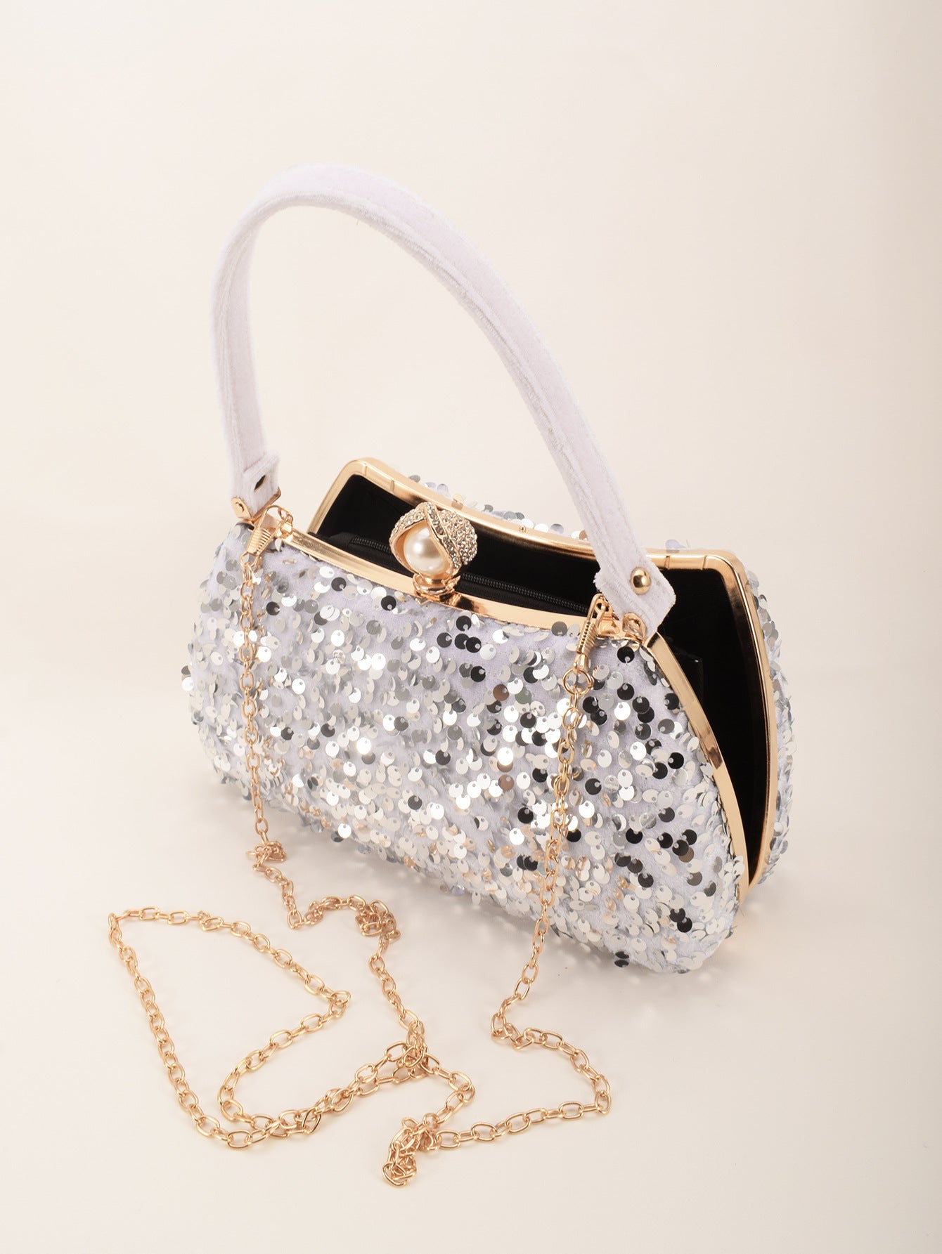 065146e676c5488693f94e9767c7c390.jpeg Fashionslee Women Anahid Sequin Clutch