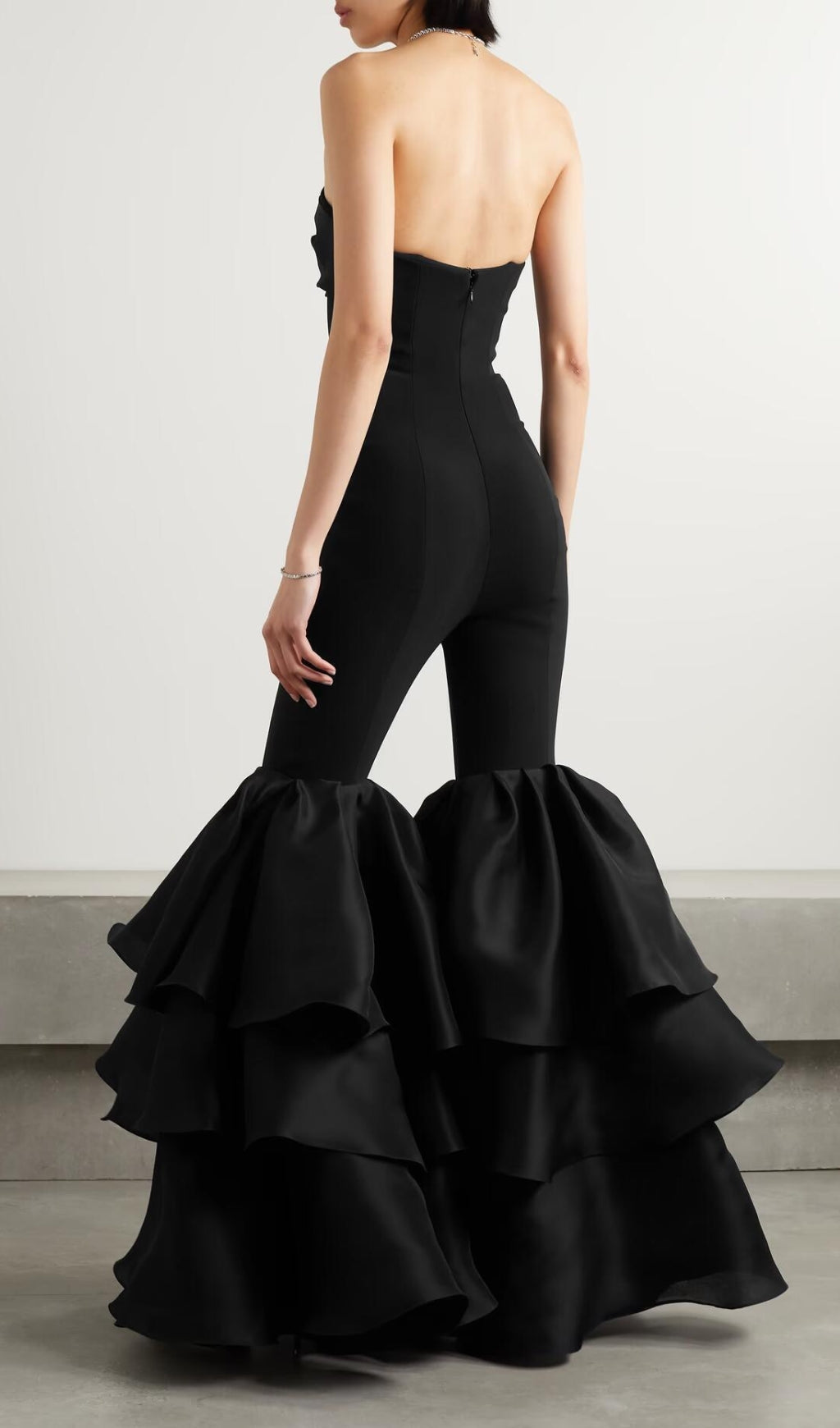 07b89a5fa77af592cc221c59c222a3a7.jpeg Fashionslee Women Black Strapless Jumpsuit With Tiered Ruffle Hem