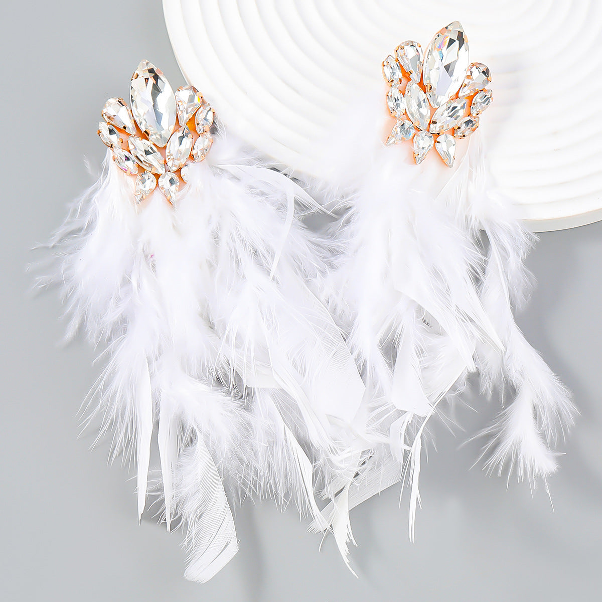 07ed280db58023a81c6ee43a5517b6f8.jpeg Fashionslee Women Rhinestone Feather Earrings
