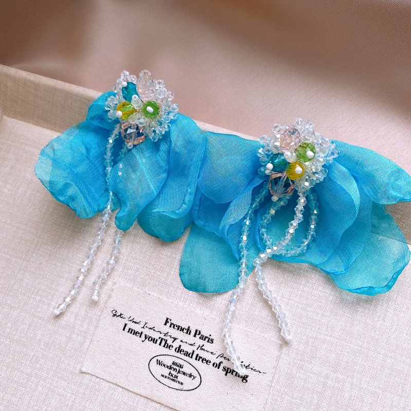 0e81511ad540f90414669a29456fc754.jpg Fashionslee Women Dick Blue Flower Earrings