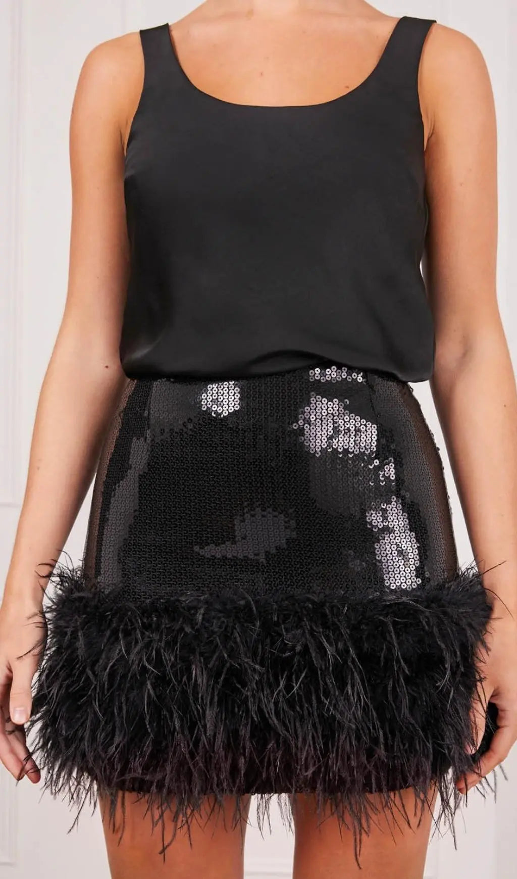 11aaadd7a3137b61774d3d1aec392b20.jpeg Fashionslee Women Sequin Feather Mini Skirt