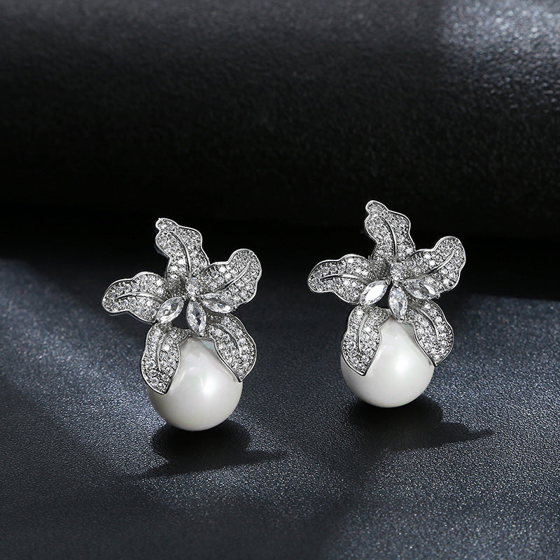 1415c54a5ed5d88ce611fc77c130d3e3.jpeg Fashionslee Women Lily Silver Pearl Earrings
