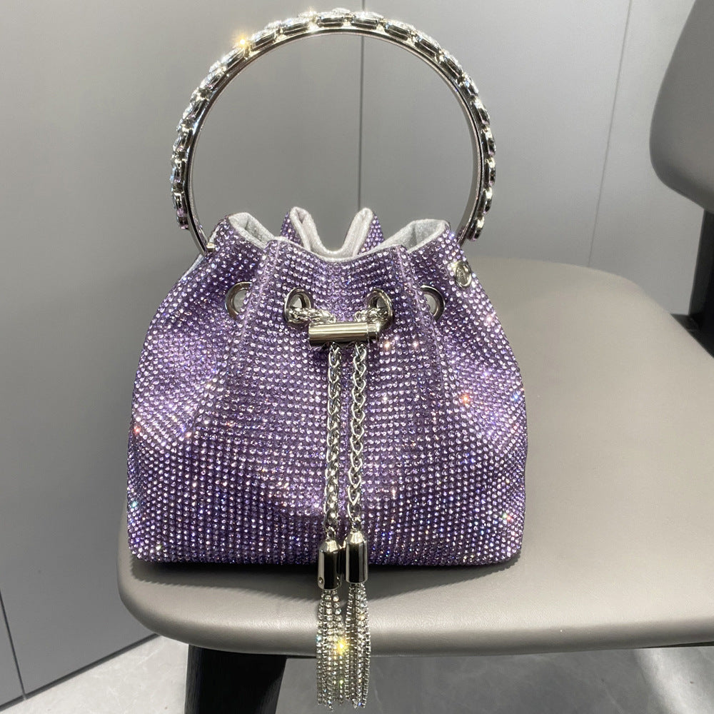 1ef1d806a8fb7efae76c93f47c3cc170.jpeg Fashionslee Women Crystal Embellished Bucket Bag In Purple