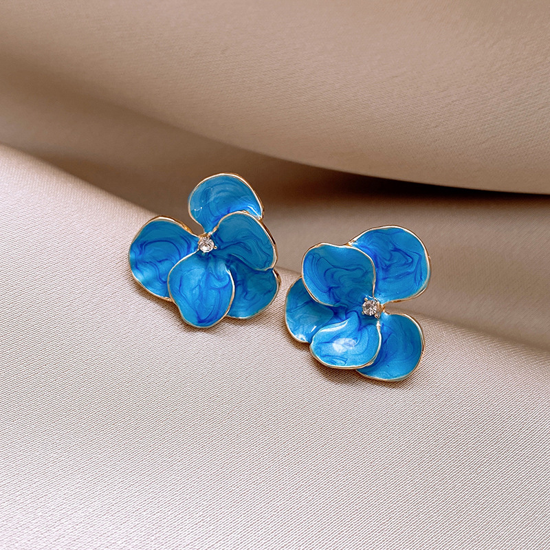 1f8c31f38b7447a18b3ffc41fd143621.jpg Fashionslee Women Derick Blue Flower Earrings