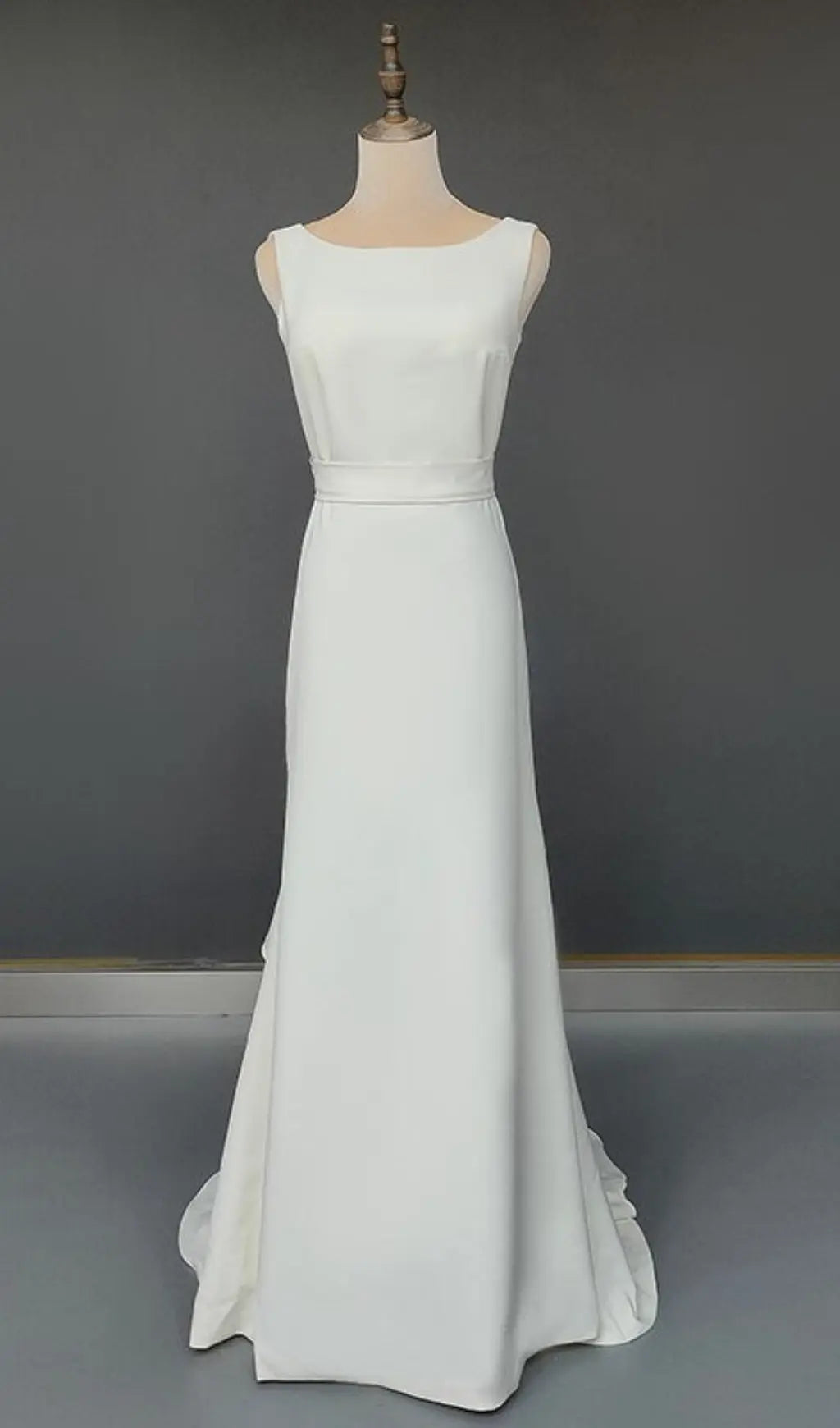 29b757ed38ac082e5a8fcc0919674092.jpeg Fashionslee Women Laminated Ruffle Sleeveless Dress In White
