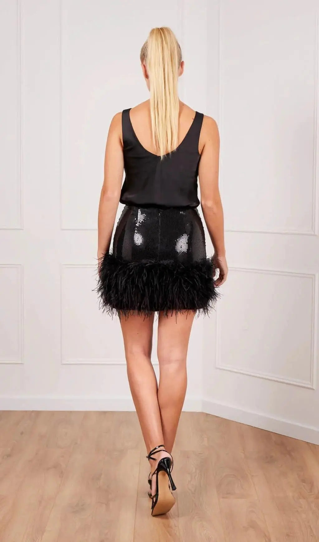 324168d3cef9442ba39df1cd0eb43376.jpeg Fashionslee Women Sequin Feather Mini Skirt