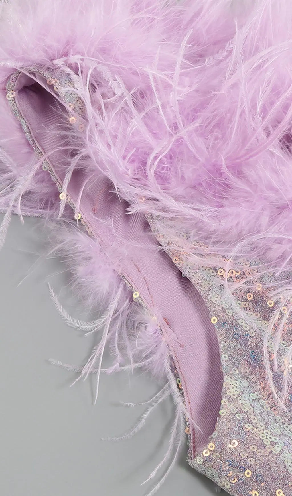 3503e9b280d72f45bb325a5d04de3cbf.jpeg Fashionslee Women Purple One Shoulder Sequin Feather Mini Dress