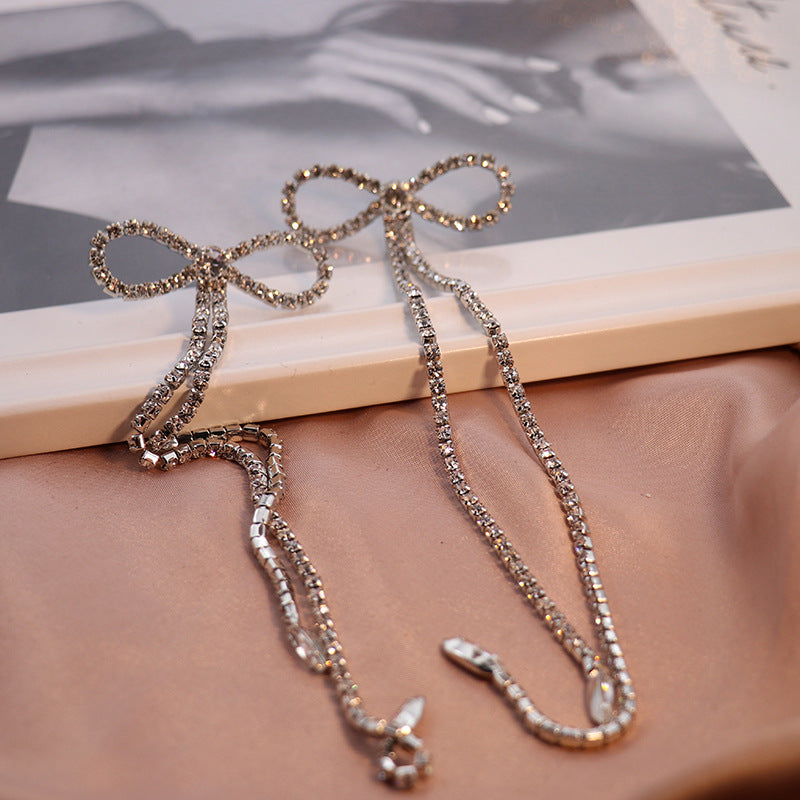 Fashionslee Women Rhinestone Bow Long Chain Earrings In White