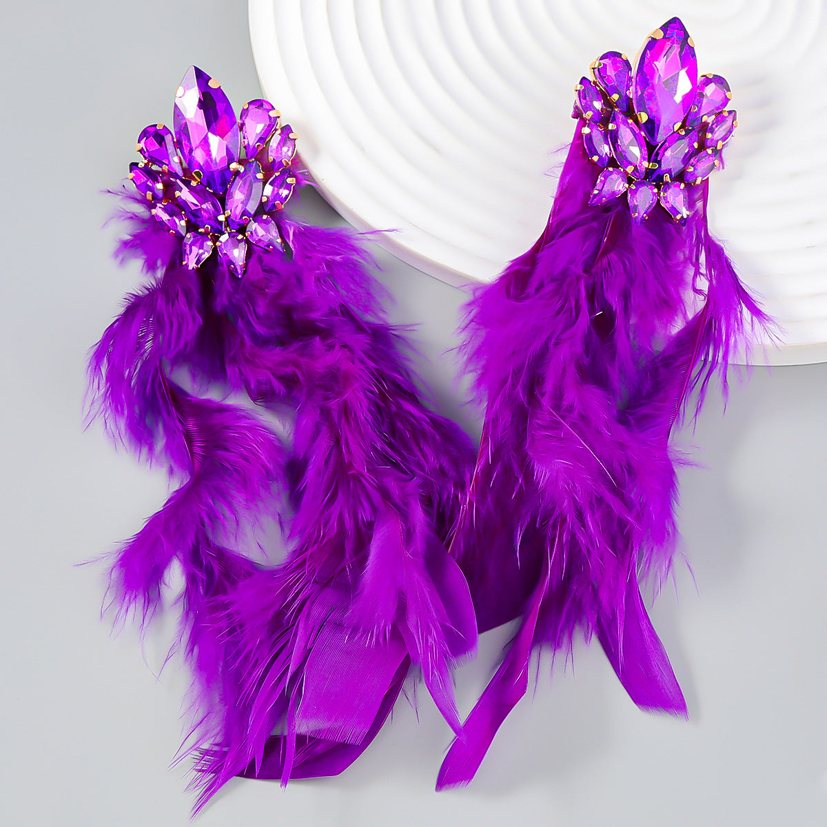 4c7993eb266d4fce9ff704e365040e29.jpeg Fashionslee Women Rhinestone Feather Earrings