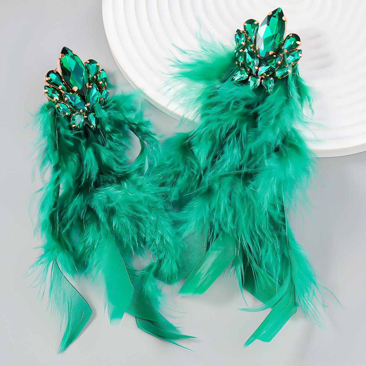 5f8f2a88d4f33efc145985b78a92a46b.jpeg Fashionslee Women Rhinestone Feather Earrings