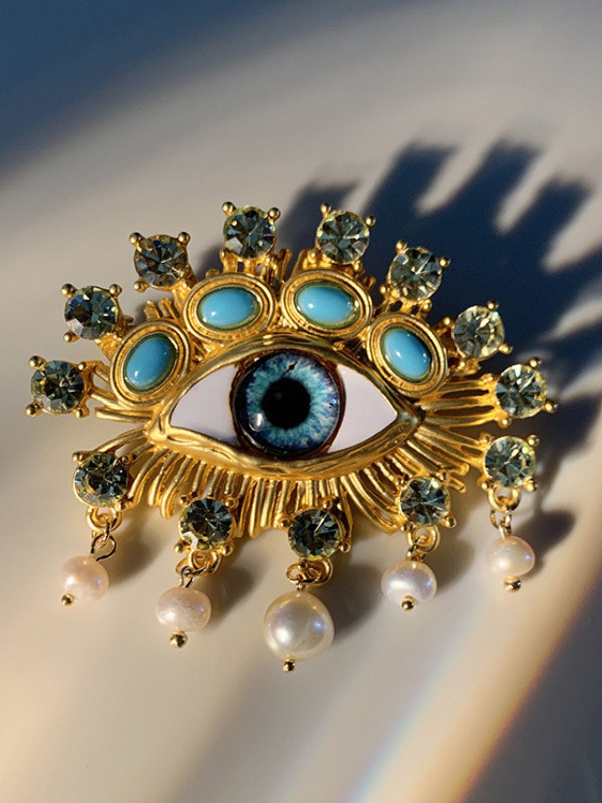 6d3d8c0f04d35ed7ac3d4a442e873f49.jpeg Fashionslee Women Pearl Embellihsed Eye Brooch