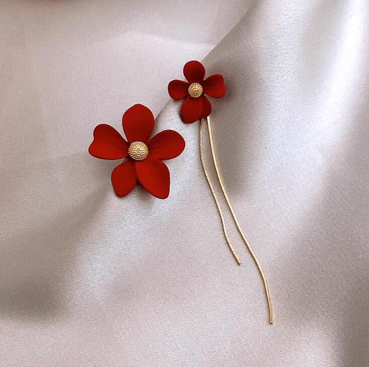 7500fb498c7ffad9148ceb719d08e0f8.jpeg Fashionslee Women Asymmetrical Tassel Flower Earrings