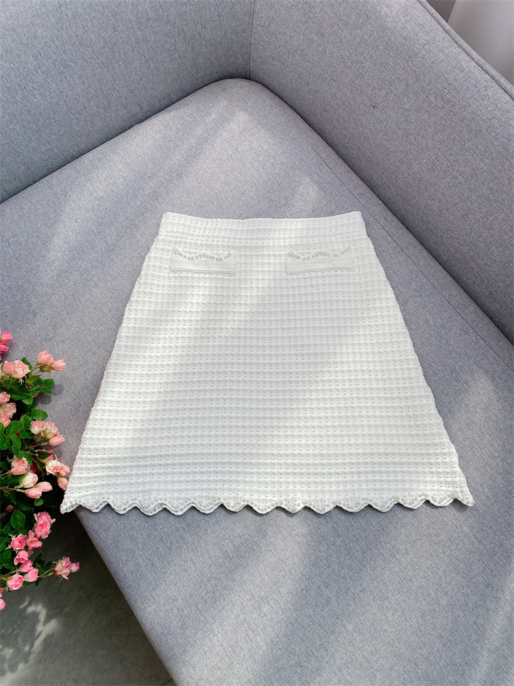 7bb552ffcd446cc0824b5075be2da17f.jpg Fashionslee Women Pearl Bead Mini Skirt