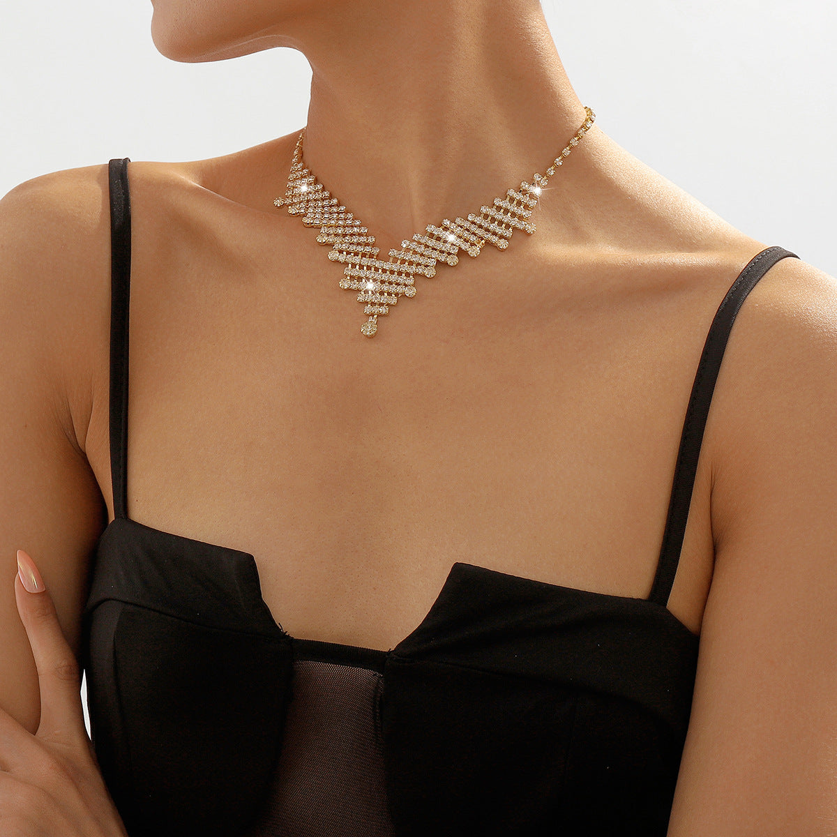 7e9b7c1d68b97711c8d5f4f3dda899da.jpeg Fashionslee Women Gold Rhinestone V-Shaped Necklace