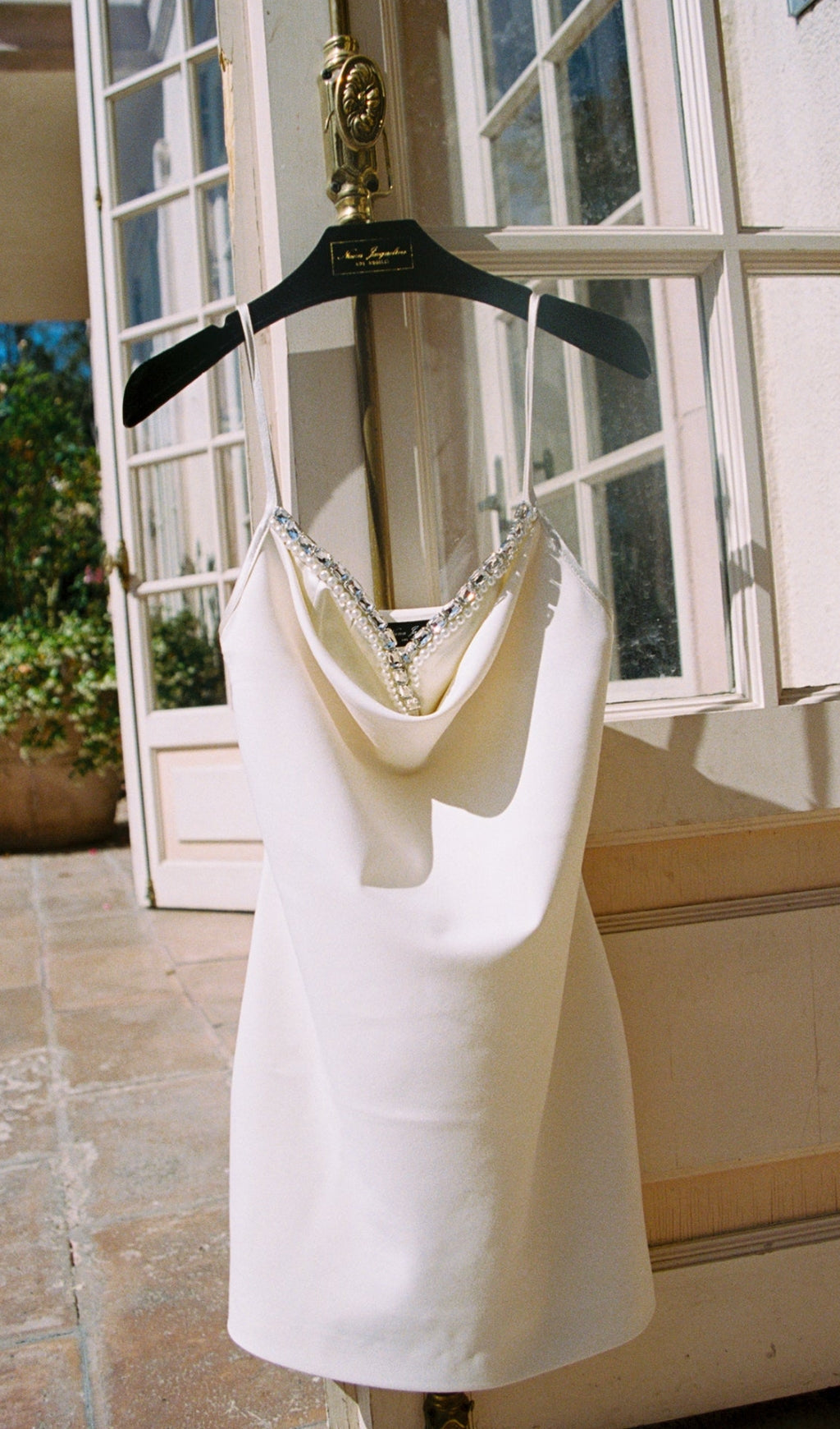 7edc915d984c1775854681c0fc1fab2b.jpeg Fashionslee Women Satin Pearl Mini Dress In White