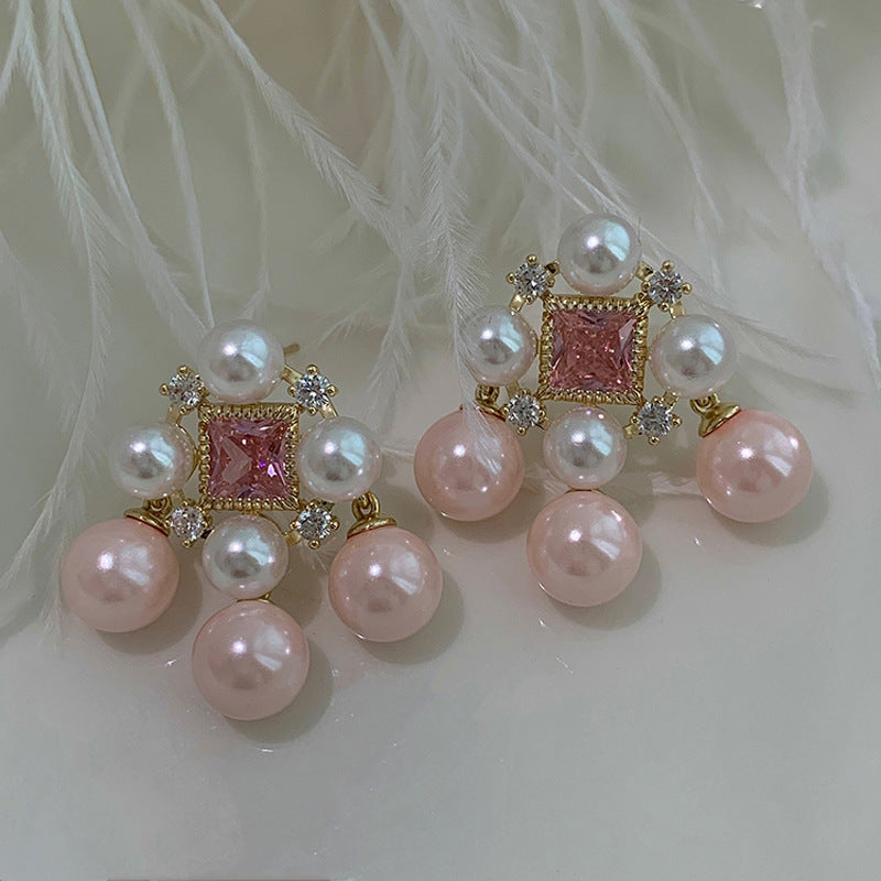 82e5b63a1cacdc33be5749303ea00df0.jpeg Fashionslee Women Pink Pearl Earring
