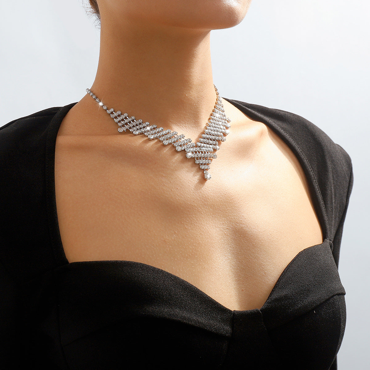 843a160a900230b129e00a2c57f80426.jpeg Fashionslee Women Silver Rhinestone V-Shaped Necklace