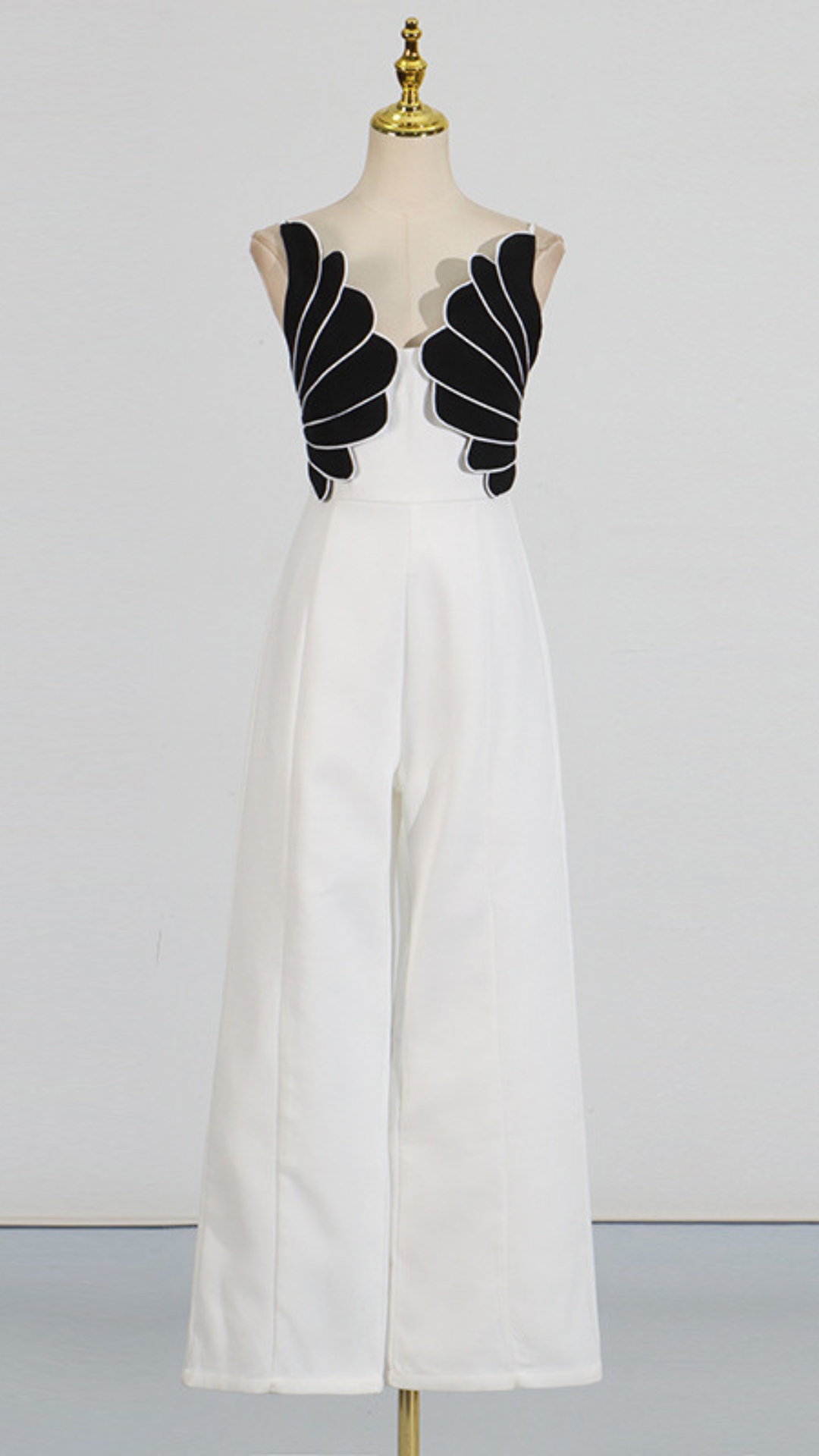 87865fcea2ae02a4bb3bcb29d6da129b.jpg Fashionslee Women Flavia White Decor Jumpsuit