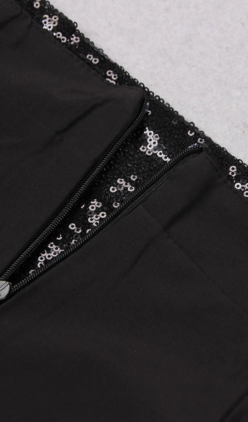93a1bcbf2e8bb16c080fd84ab6fb2f0b.jpeg Fashionslee Women Sequin Feather Mini Skirt