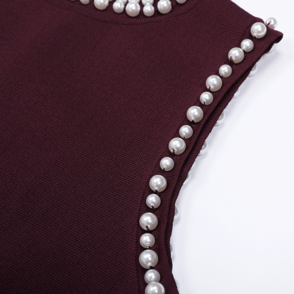 97c234b633427c67dc4f13da0f04f81c.webp Fashionslee Women Junko Sleeveless Pearl Tassel Knit Maxi Dress