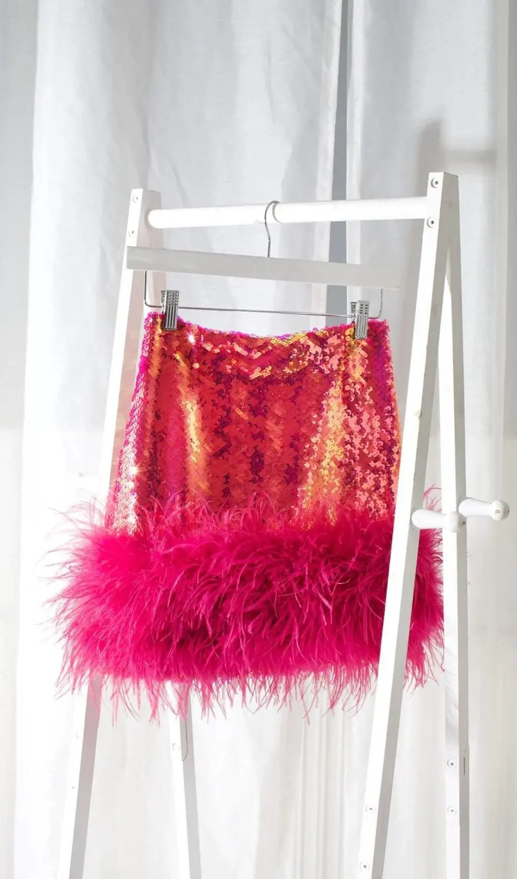 9afe60428b27a4925dfc96d2c73013fd.jpeg Fashionslee Women Sequin Feather Mini Skirt