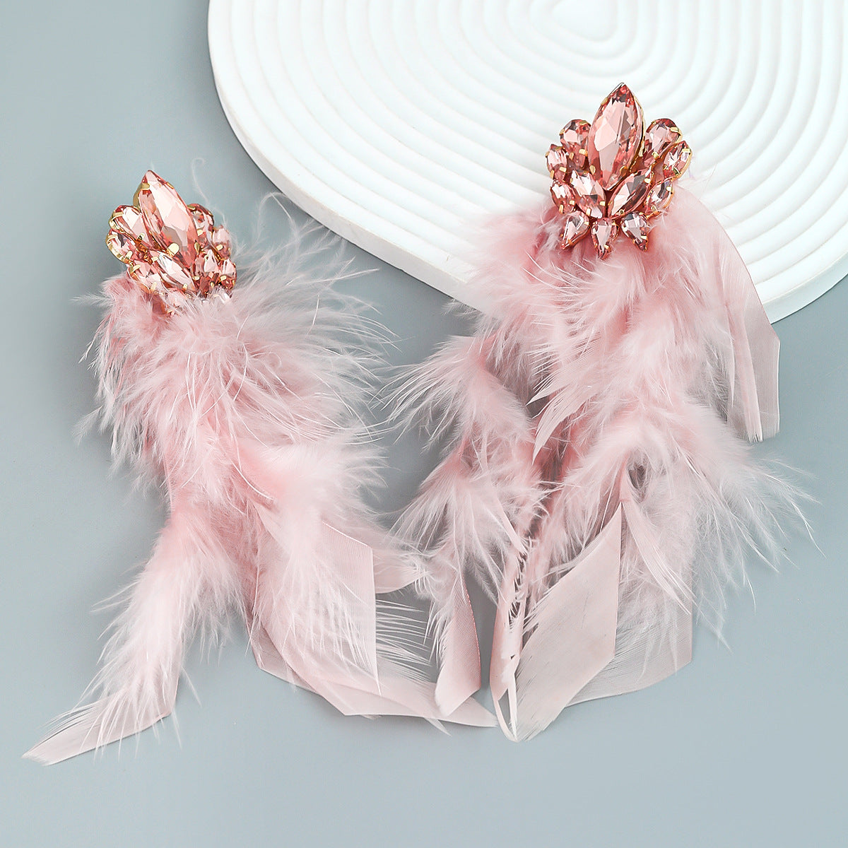 a7c0963224a0fa7f00a6ad8700202a3f.jpeg Fashionslee Women Rhinestone Feather Earrings