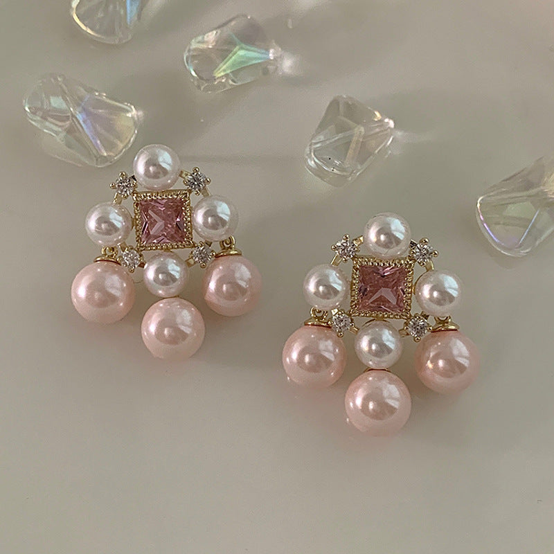 a8ea850a597409e21c0b47c63bf836dd.jpeg Fashionslee Women Pink Pearl Earring