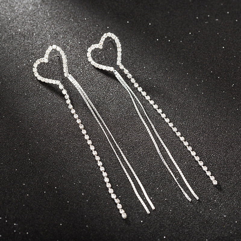 b01fd1f37d1c88aa070d160a0e4d39f4.jpeg Fashionslee Women Silver Chain Tassel Earrings
