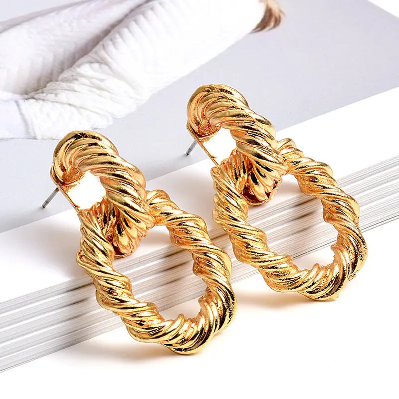 b73cd12265da8721c657ea1ab7f1cfe2.jpeg Fashionslee Women Fashion Golden Earrings