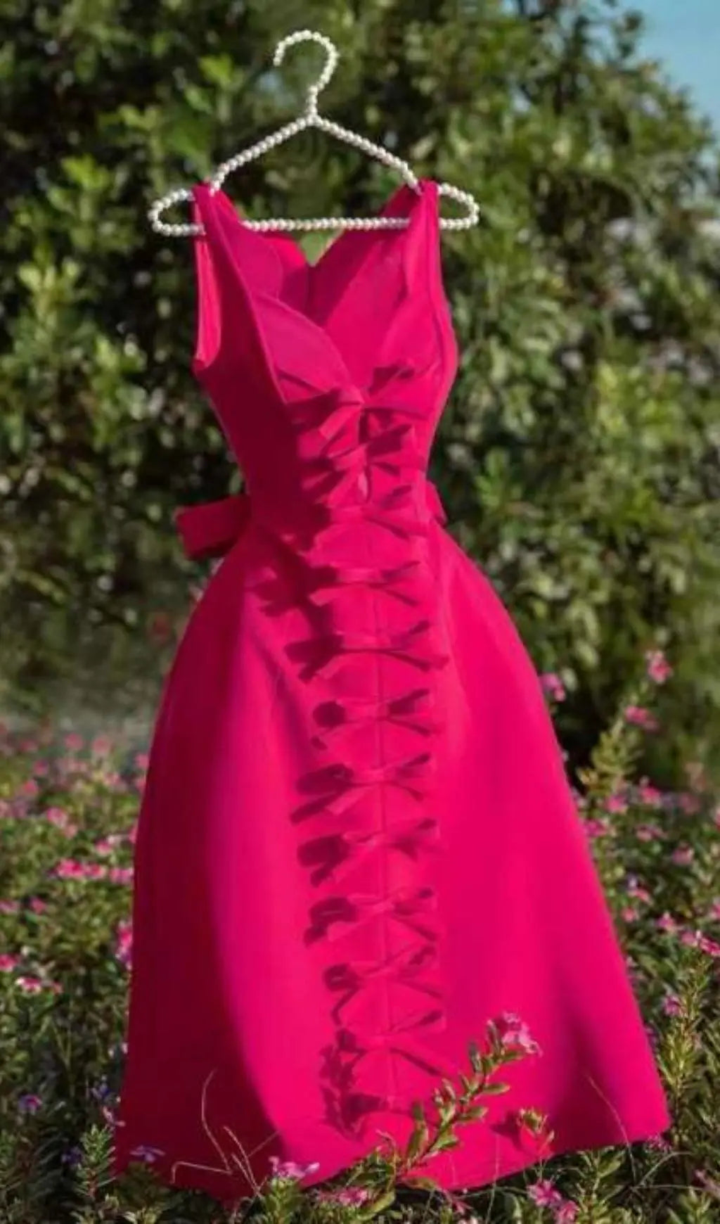 bac75f19ec81f1eeae1bf5224bb10e75.jpeg Fashionslee Women Pink Bowknot Strappy Midi Dress
