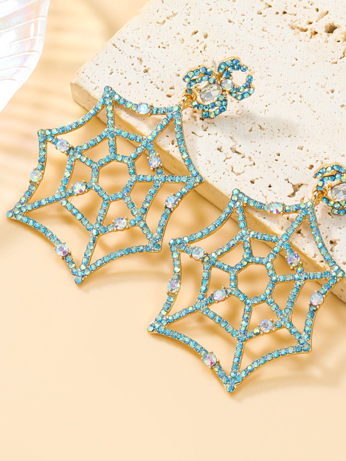 bfb06d68e3f3bf74ccb0dd1d536c6945.jpeg Fashionslee Women Cobweb Rhinestone Earrings