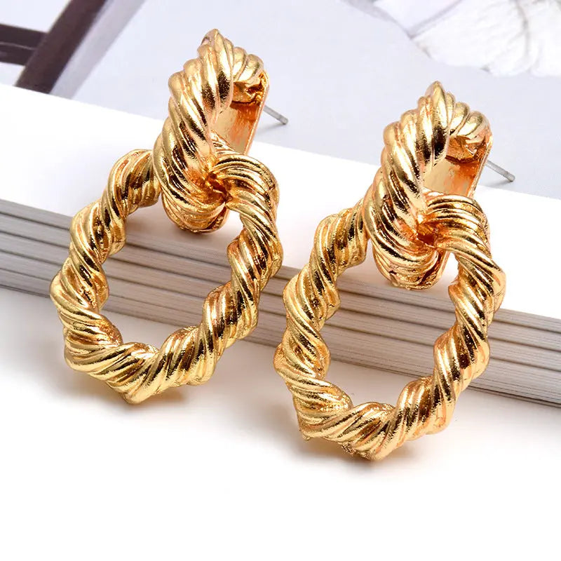c3b5824ec043b322e36feb7b530ecb43.jpeg Fashionslee Women Fashion Golden Earrings