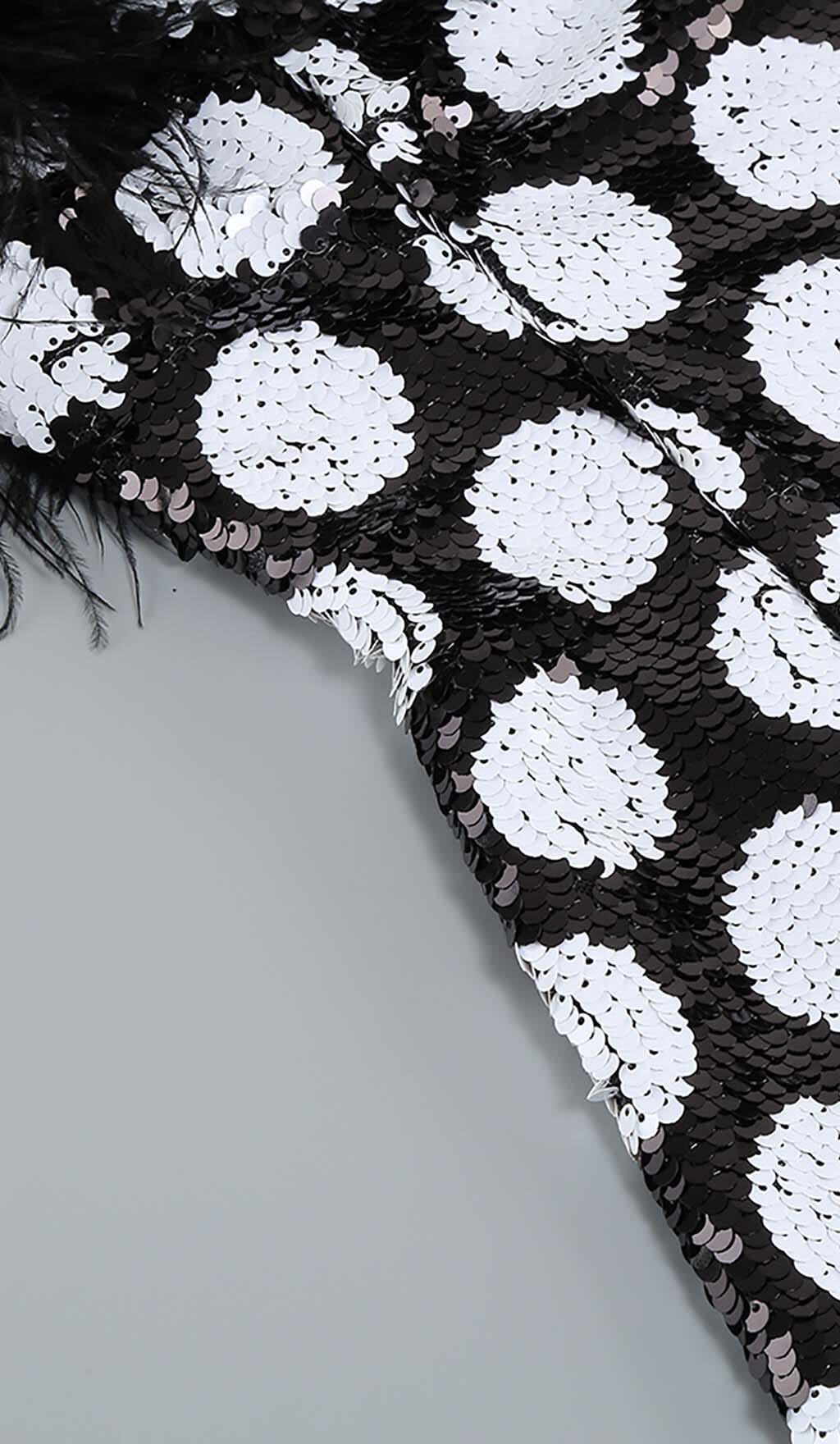 d2fed799fde41b5e1cec89a9eff8d3de.jpeg Fashionslee Women Feather Trim Polka Dot Mini Dress