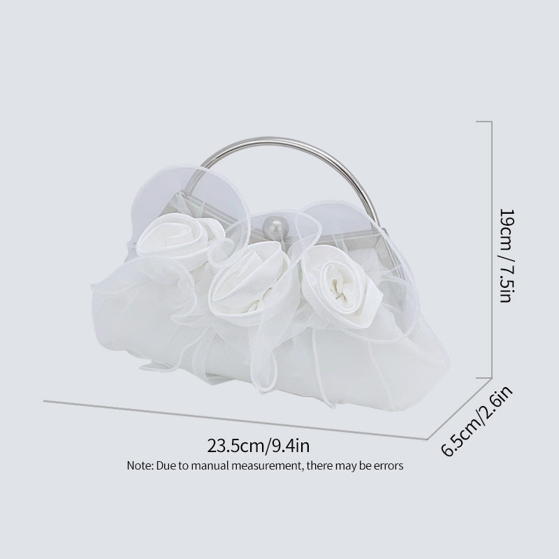 d4c602c4fb42684e56410a03e8ff2951.jpeg Fashionslee Women Anamika Flower Embellished Clutch