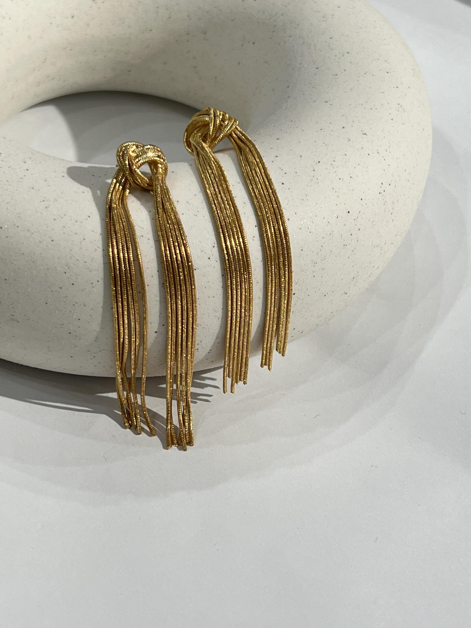 df05e3b5f0f8fc953cfaa232644c3c9f.jpeg Fashionslee Women Gold Tied Tassel Earrings