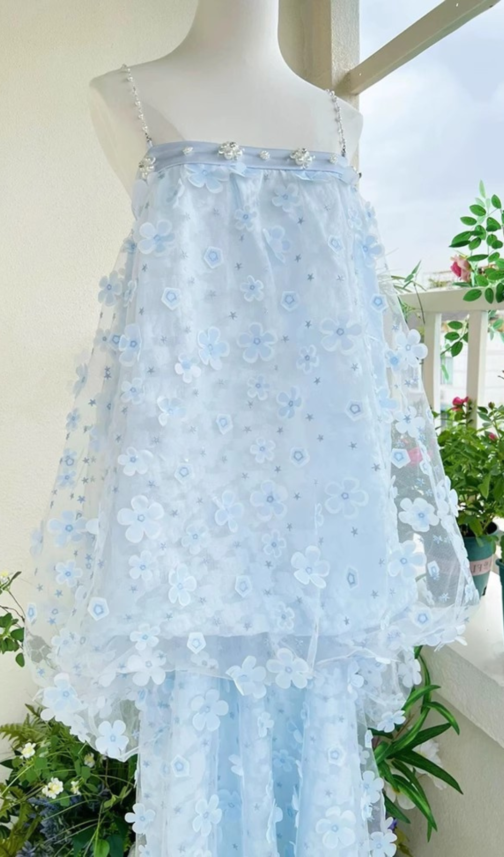 e4a6416d965dc1b9e20ee25a7a2844ee.png Fashionslee Women Harsha Blue Flower Embellished Maxi Dress