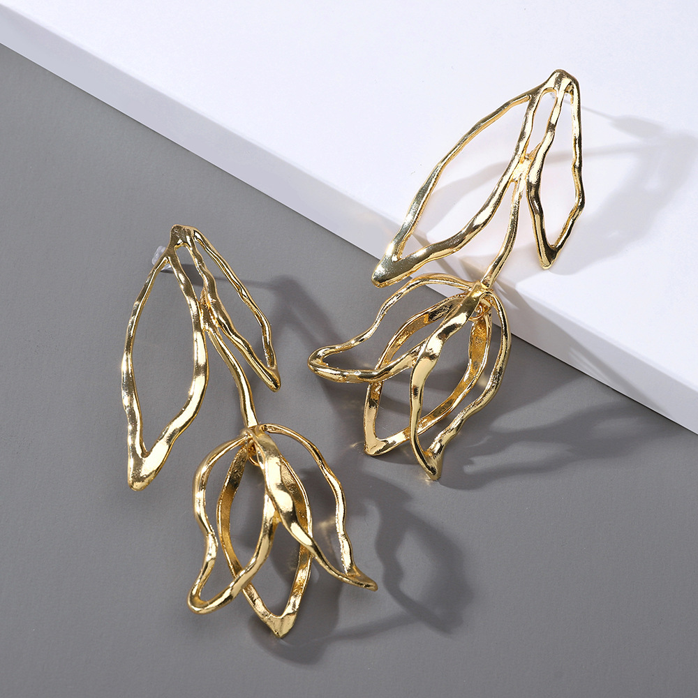 e7389f2cbde42e3fb23e91bf599d28a1.jpg Fashionslee Women Dorcas Gold Flower Earrings