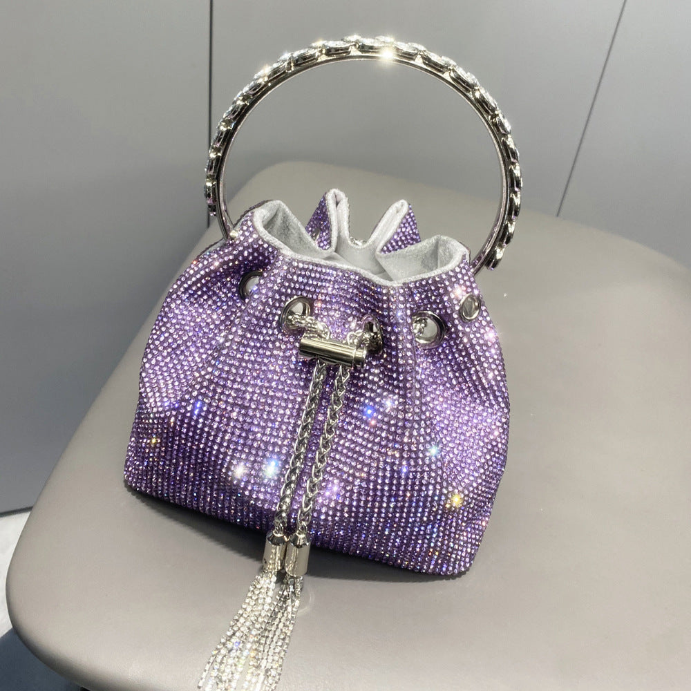 eb59ba055f9d8aae333407f25f643a31.jpeg Fashionslee Women Crystal Embellished Bucket Bag In Purple