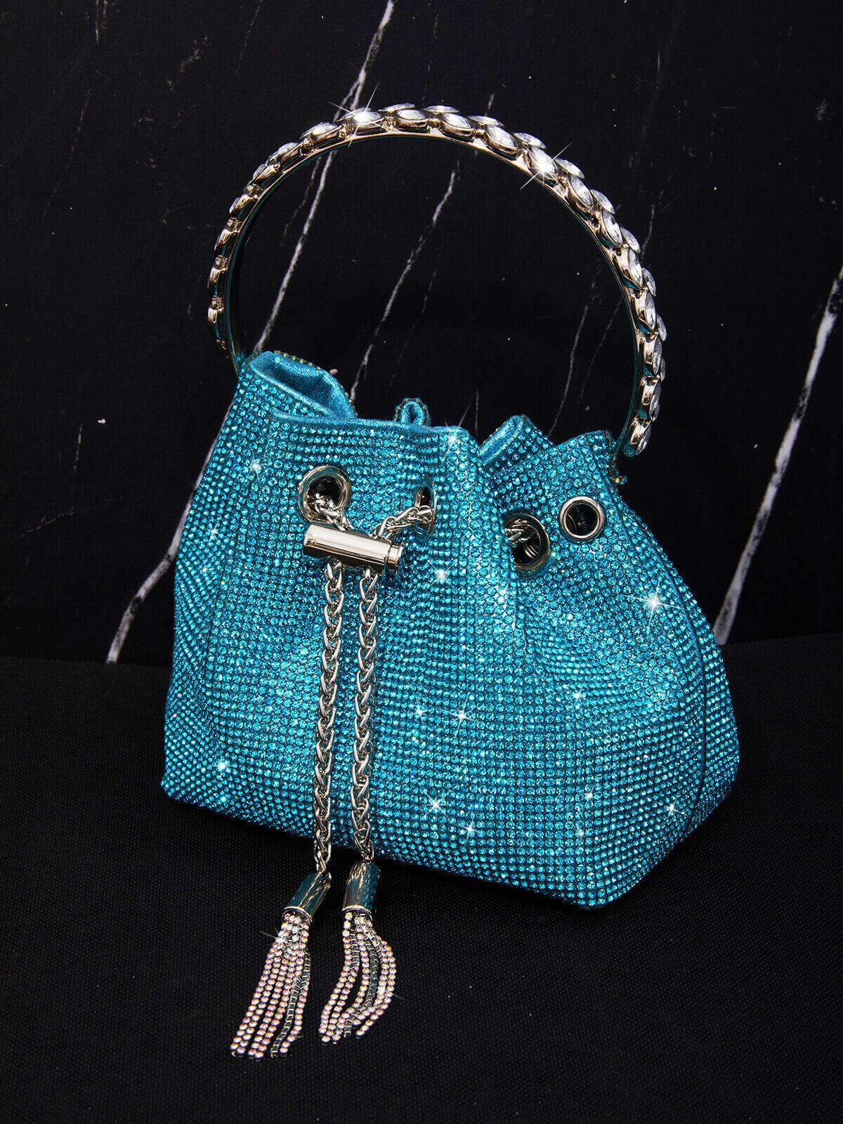 f2e5cc2b8477fd7ed7ada2b60cce3b46.jpeg Fashionslee Women Crystal Embellished Bucket Bag In Blue