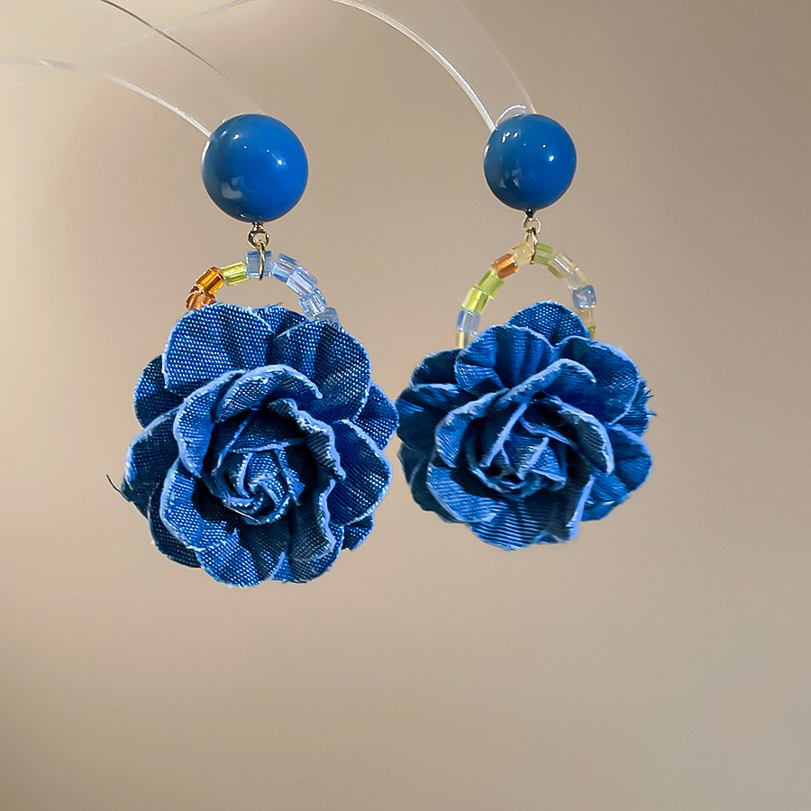 f7c574700fff3f6831b4b3c695bcf5fc.jpg Fashionslee Women Fabienne Blue Flower Earrings