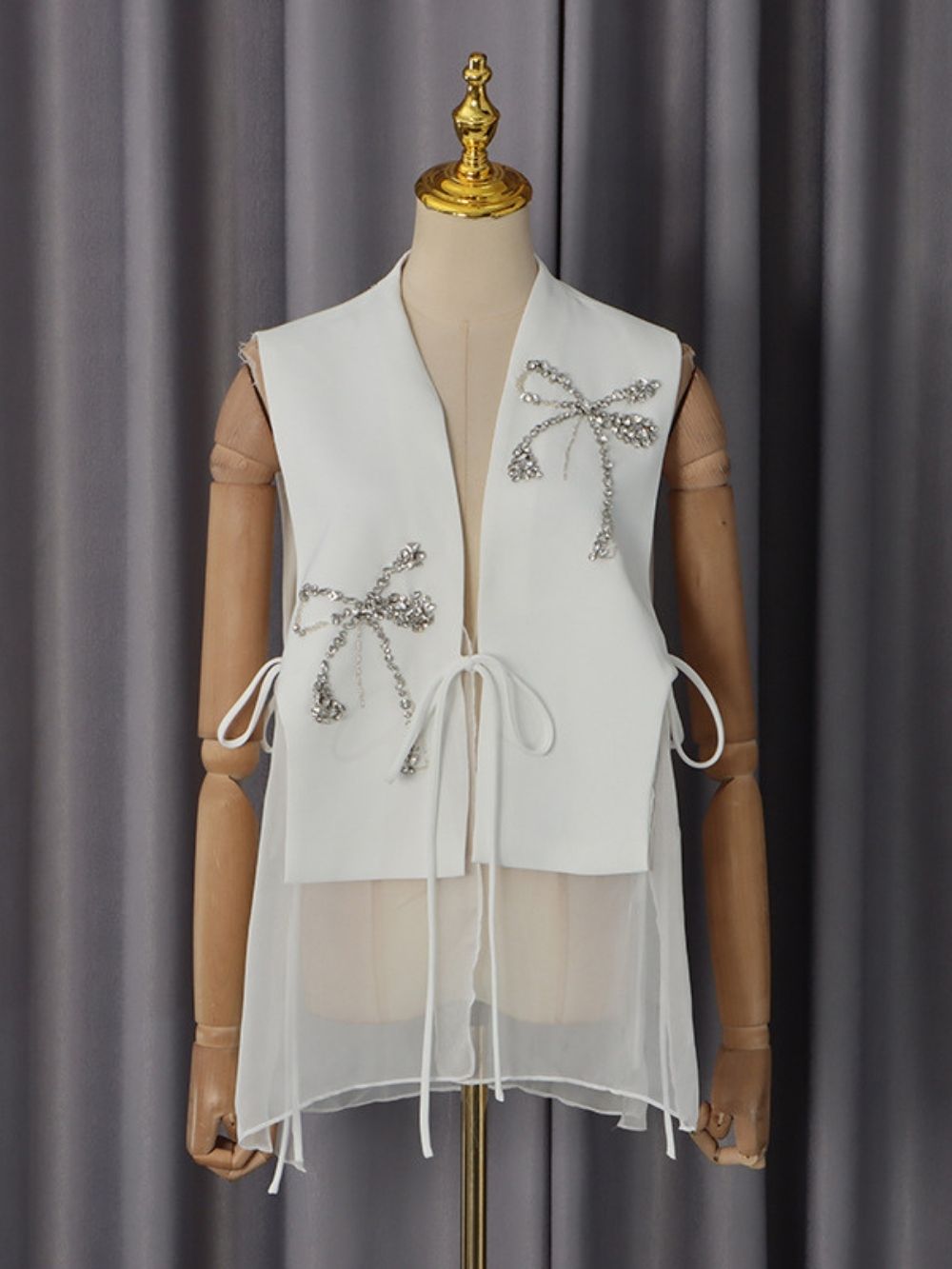 145f041ed411d5cf7cd9154637cd3cbb Magdaline Bow Diamante Vest