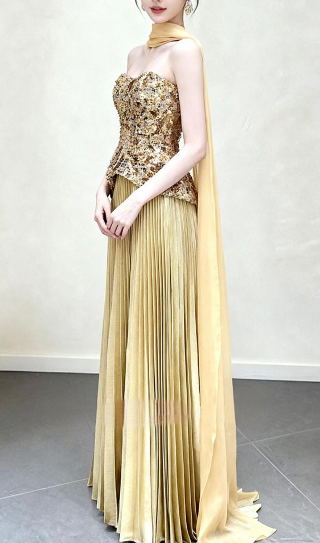 2d4d9e075d52199a080790f12b44ca82 Kriti Gold Strapless Pleated Maxi Dress
