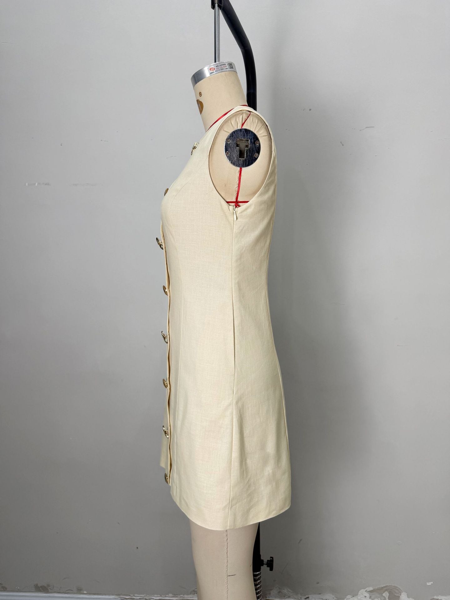 74ca843087bac29b31f1fab2629b8461 Pale Yellow Sleeveless Round Neck Star Shell Button Straight Mini Dress