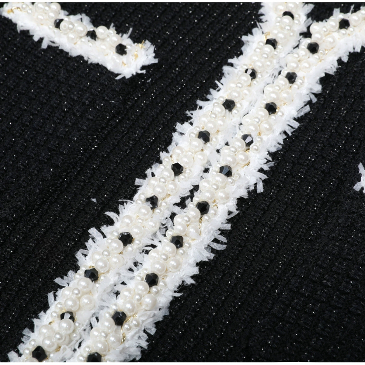 a0dcf8a12e47d82c4fb2dc19d7e74d51 Kaula Black Beaded Long Sleeve Knit Midi Dress