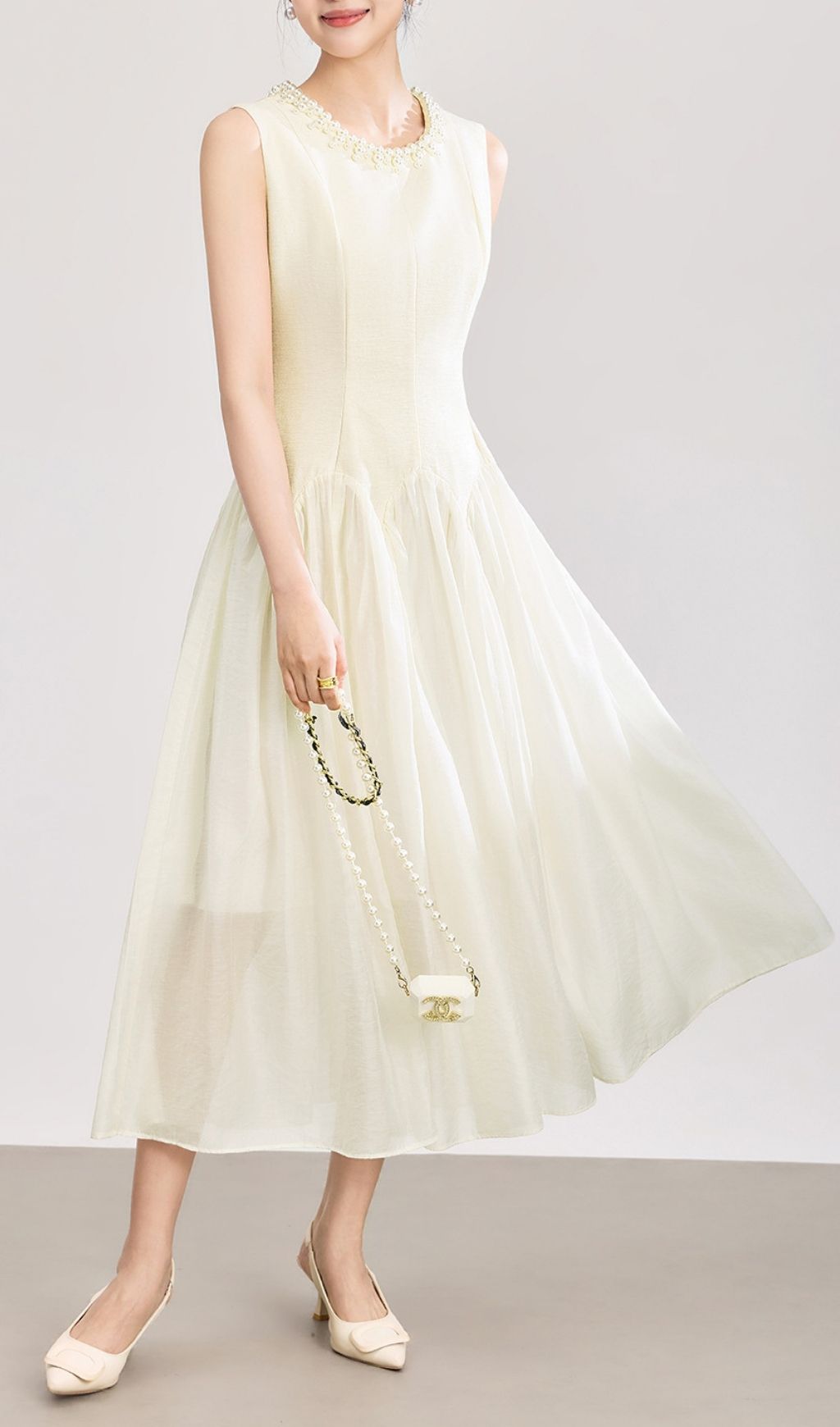 cbe5d86b25b69f627a8b3484a801214d Sleeveless Midi Dress With Tulle Skirt And Pearl Embellished Collar
