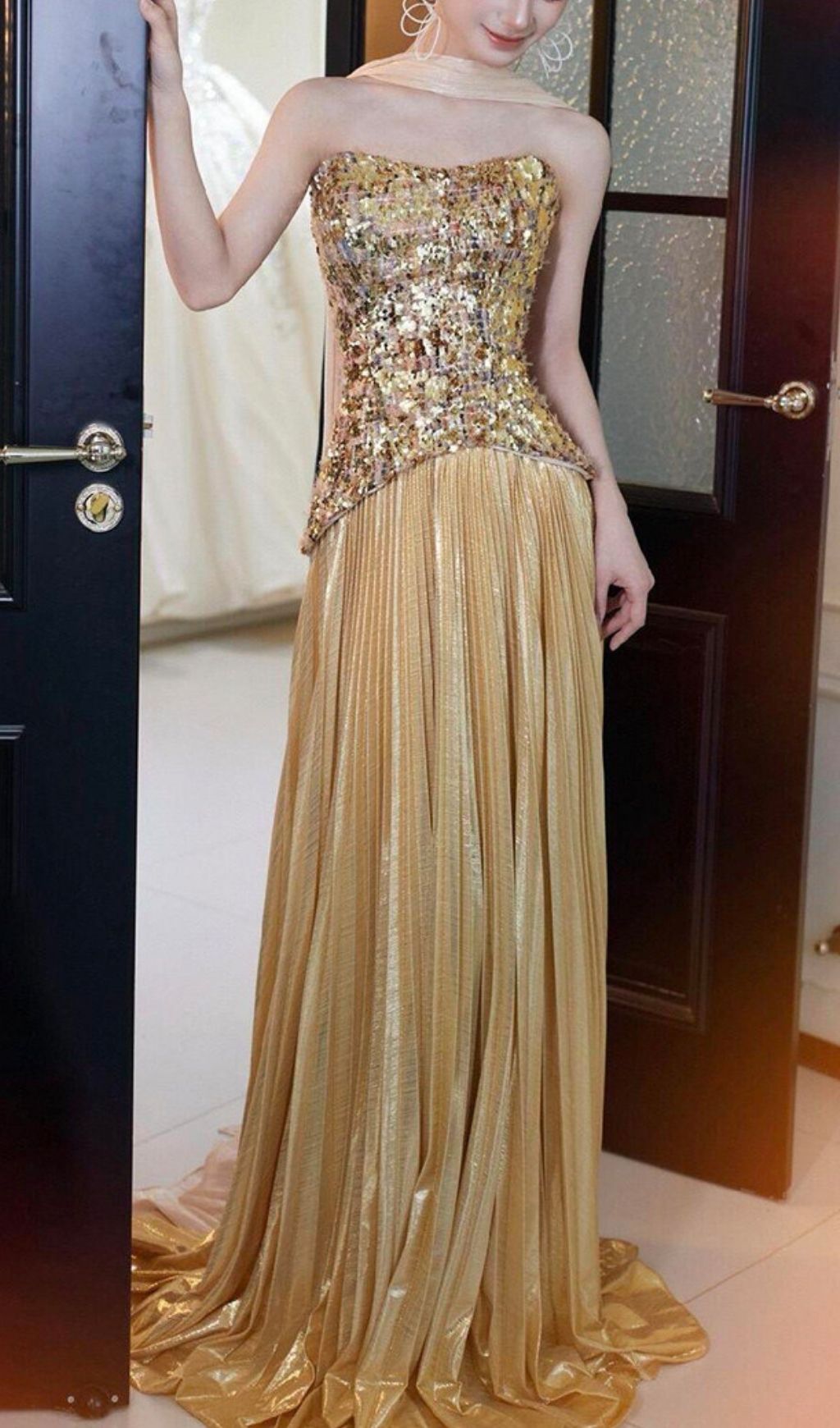d370ba433bb2d4137e60977ee9e17243 Kriti Gold Strapless Pleated Maxi Dress