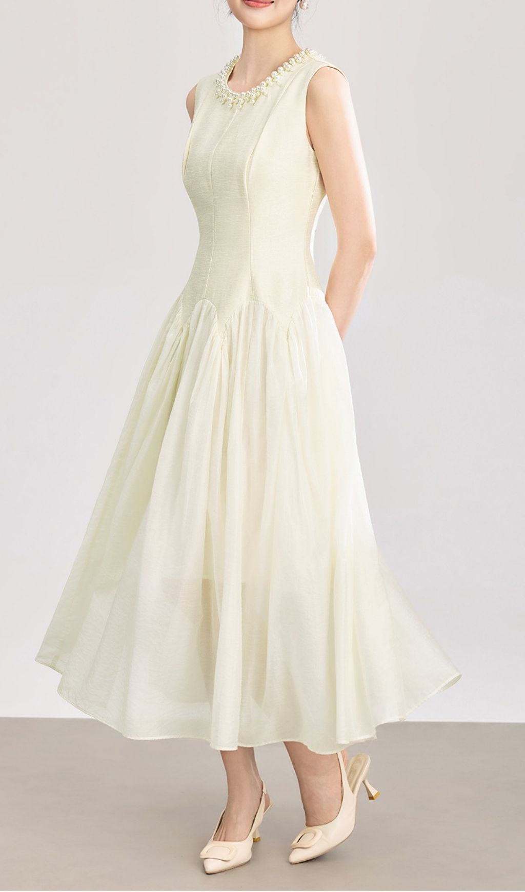 d7bf9322113b962b13ffbb6ae3044c00 Sleeveless Midi Dress With Tulle Skirt And Pearl Embellished Collar